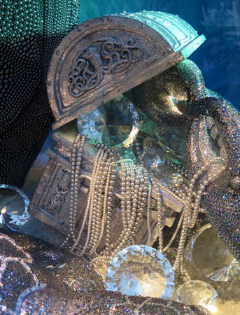 Still life of sparkling sunken treasure chest filled with pearls and diamondsの写真素材