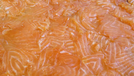 Platter of fresh organic sliced lox (smoked salmon)の写真素材