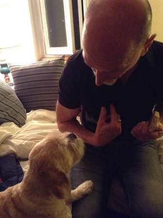 Man with small dogの素材