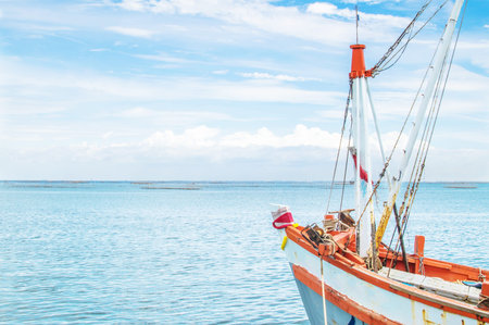 Fisherman boat heading to the sea in the summer season