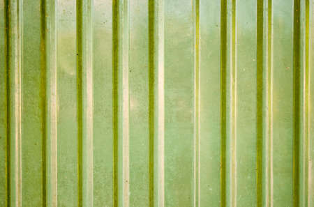 Close up galvanize wall with the yellow green colorの写真素材