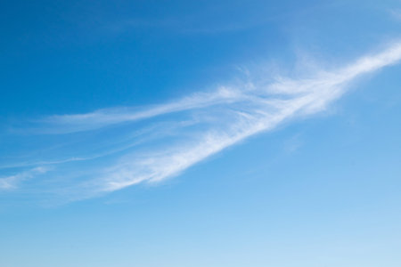 The strip of cloud on sky in the sunny day