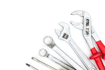Wrench and screwdriver tools on white background. Technical tooling concept.の写真素材