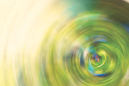 Abstract Background of green tone spin circle radial motion blur.の写真素材