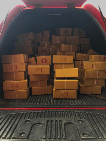 Parcel box on a car pickup. Parcel delivery post. logistic, transport, delivery.