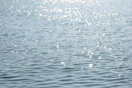Abstract blurred image of blurred soft light bokeh on the sea background. Bokeh pattern. Wallpaper. Bokeh background.の写真素材