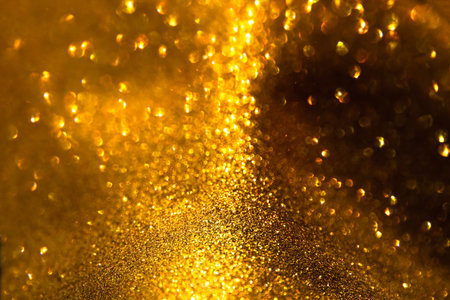 Gold glitter background, Gold abstract background with blurred bokeh, Abstract bokeh lights with...