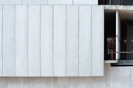 Precast concrete walls on building structures. Precast concrete manufactory product for construction industrial. Concrete wall panel. Building construction.の写真素材