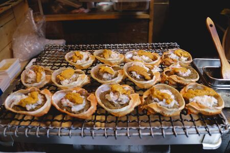 Japanese crab shell grilling in the streetsの写真素材