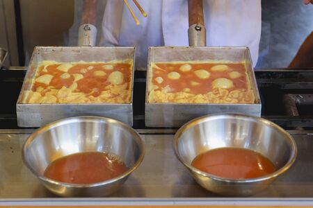 Japanese egg omelette makingの写真素材