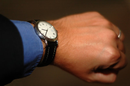 Businessman Looking at his Watchの写真素材