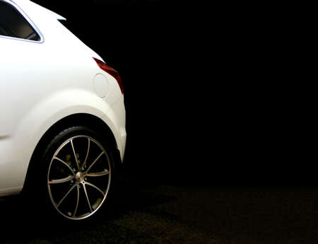 Close-up of the rear of a small white carの写真素材