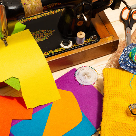 Sewing on a sewing machine design. Making objects with your own hands. Multicolored threads and...