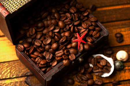 Image of middle-aged coffee beans. Poured into a pirate chest. Precious, expensive, tonic,...