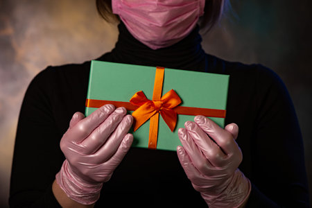 Trolley for transporting goods. Safety and consumer protection from the virus. Delivery of fruit from the store. Tangerines and apples.の写真素材
