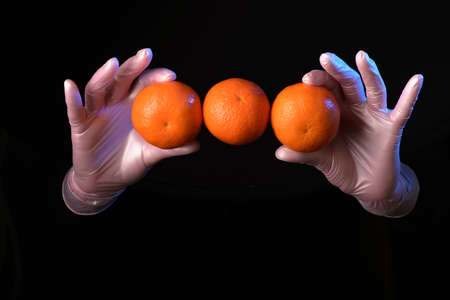 The magician shows the focus session. Sleight of hand and distraction of the viewer's attention. A breathtaking sight.の写真素材