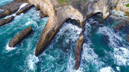 Water caves off the coast of Santa Cruz, CA.の素材
