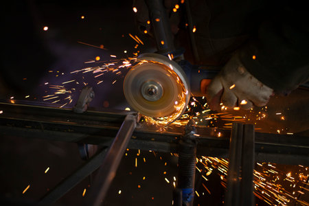 Metal cutting. Sparks from processing a metal profile.の写真素材