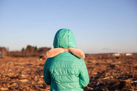 A child at a clearing. Environmental protection by children.の写真素材