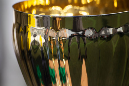 Golden football cup. Sports award. A big cup for victories. The football competition ended with a...