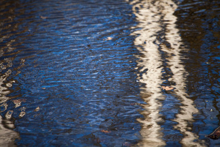 Water surface texture. Ripples on the lake. Beauty of nature.