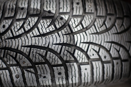 Wheel tread. Rubber tire from the car. The texture of the wheel.