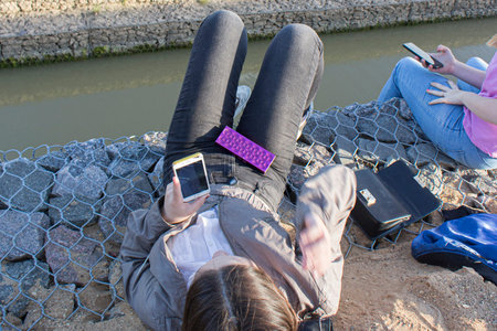 Girl in the country. A teenager is dreaming. Beautifully dressed girl. Fashion among youth. A...
