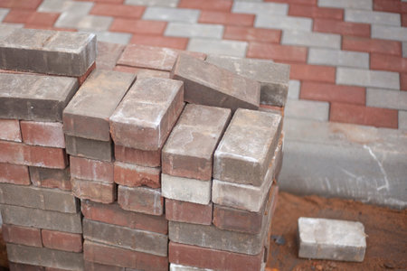 Paving slabs prepared for the repair of the pedestrian zone. Brick blocks are stacked. Stone laid by...