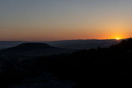 The sky at sunset. Sunset in the mountains. Beautiful evening in summer. Landscape photography.の写真素材