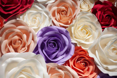 Texture of large roses. Artificial flowers for the background. Rose buds made from plastic. Volumetric model of petals.の写真素材