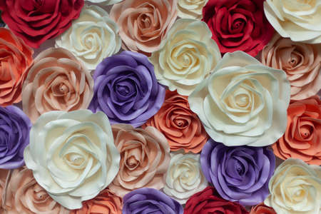 Texture of large roses. Artificial flowers for the background. Rose buds made from plastic. Volumetric model of petals.の写真素材