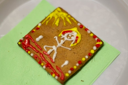 Gingerbread cookie with icing. Homemade baking. A festive treat. Sweetness for tea. Tasty food....