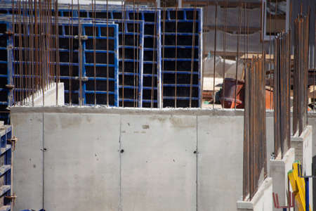 Concrete blocks at a house construction site. Building site on the street. Creation of the building frame.の写真素材
