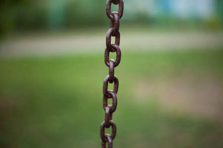 Metal chain. Chain in taut sucking. Steel product.の写真素材