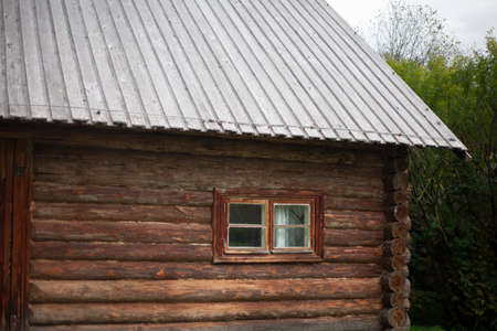 Russian sauna. House of logs. Old building. 19th century architecture. Untreated wooden walls.の写真素材