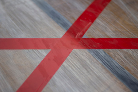 Red cross prohibition sign. Red  tape that prevents you from sitting at the table. Quarantine...