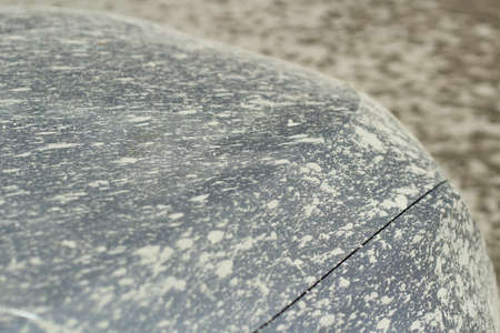 The car is splashed with mud. Ipachkana car after the trip. The surface of the vehicle is splashed with cement.の写真素材
