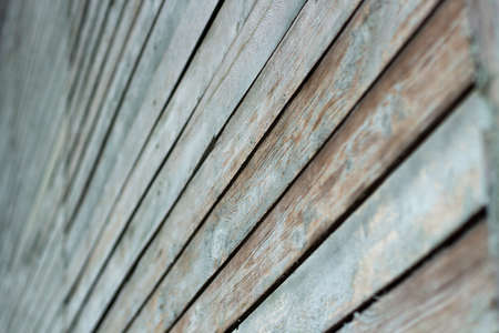 A wall of planks. Painted board texture. Old boardwalk in the street.の写真素材
