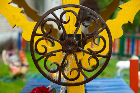 Spindle wheel. Metal circle. Round wrought iron. Well handle. The handle is rotary. Russian metal forging.の写真素材