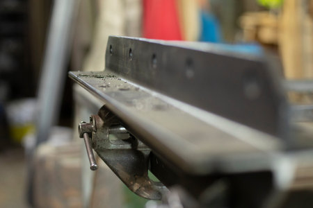 Metal in the workshop. Steel processing. Details of the construction are being processed. Raw iron.