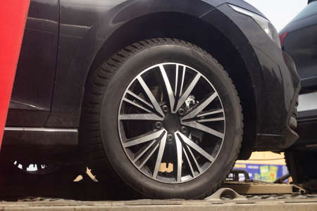 The wheel of the car. A tire on the transport. Drives by car. The wheel of the new car.の写真素材