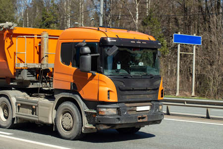 Car on the road. The car is on the street. Transport in the summer. Highway for the movement of cars.の写真素材