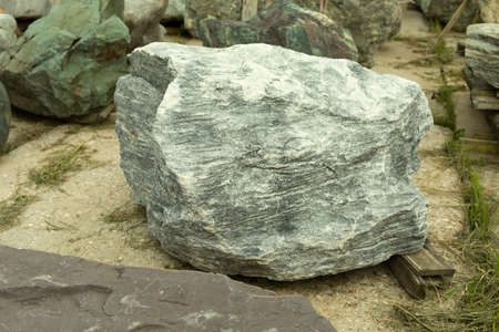 Landscape stone. Stone for installation in the park. Cobblestone prepared for garden landscape design.の写真素材