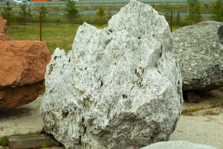 Landscape stone. Stone for installation in the park. Cobblestone prepared for garden landscape design.の写真素材
