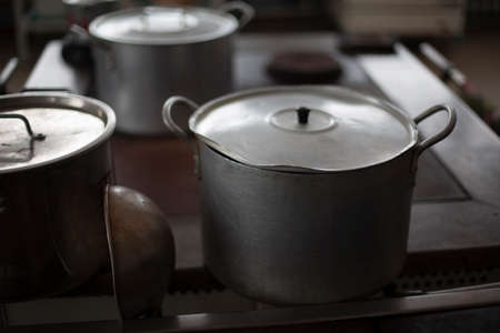 Cooking pans. Kitchen tools. Items in the dining room. Large water tanks. Cooking at school.の写真素材
