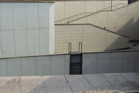 Staircase at the pedestrian crossing. Place of descent by steps. Pedestrian infrastructure in the city.の写真素材