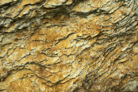 The texture of the stone in natural light. Rock details.の写真素材