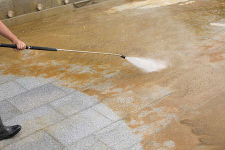 Washes away dirt with water pressure. Rust remover. high pressure water scrapes dust off the surface.の写真素材
