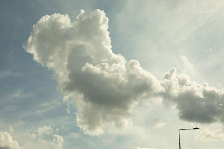 Clouds in the sky. Summer weather. Fluffy clouds in the summer atmosphere.の写真素材