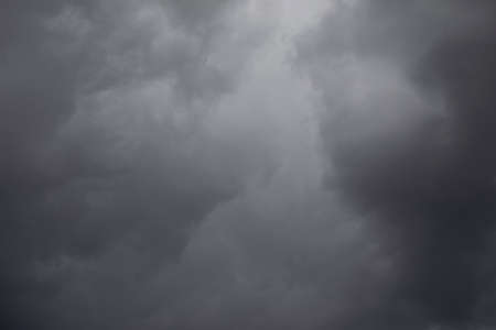 Gray sky. Cold weather. Clouds covered the sky. Weather changes. Cooling in Europe.の写真素材